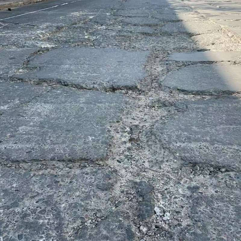 北关路面起砂露石子修补料